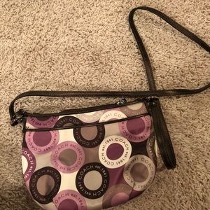 Purple and white coach purse
